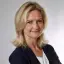 Porträtfoto Katharina Priesnitz von Energie Brandenburg in schwarzem Blazer und weißer Bluse.